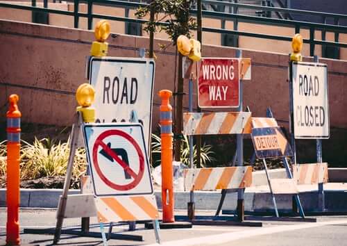 Wrong way, road closed signs.