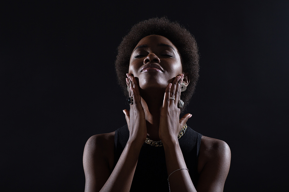 Black woman putting hands on face. When you're able to gain acceptance of the moment and find a way to move forward, freedom is possible. Why not try acceptance and commitment therapy in Detroit, MI. Our online therapists would love to help via online therapy in Michigan. Call now and begin act therapy soon!