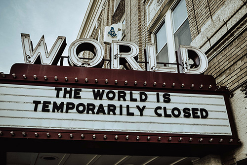 Theater sign with sign indicating closure. Beginning online therapy in Michigan can help you understand where you are relationship to pandemic dating. If you need support begin therapy or try couples therapy for individuals today. Call now to work with a couples therapist.