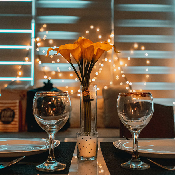 Glasses on table with lights. Needing support is ok! The world is different. Try online therapy in Detroit, MI for help. Or consider couples therapist with a skilled couples therapist who can give you perspective.